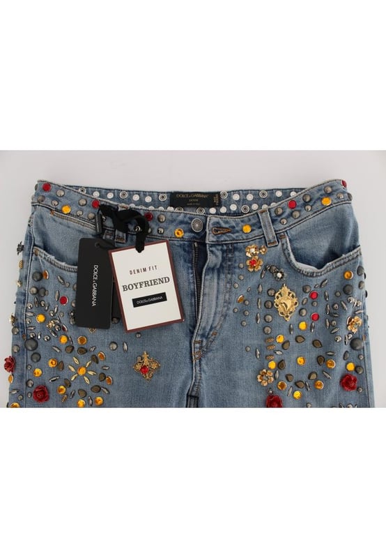 Gorgeous brand new Dolce & Gabbana blue wash crystal heart Roses embellished enchanted Sicily boyfriend fit jeans
  Made from a blend of 69% cotton 15% brass 5% crystal 5% zama 3% plastic 2% glass and 1% elastane
  Light blue wash with gold and silver metal detailing
  Zipper and button fly closure
  Multicolor crystal embellishments
  Two front pockets and back pockets
  Logo details
  Made in Italy
  Exclusive and rare one of a kind pair of jeans
Material: 69% Cotton 15% Brass 5% Crystal 5% Zama 3% Plastic 2% Glass 1% Elastane