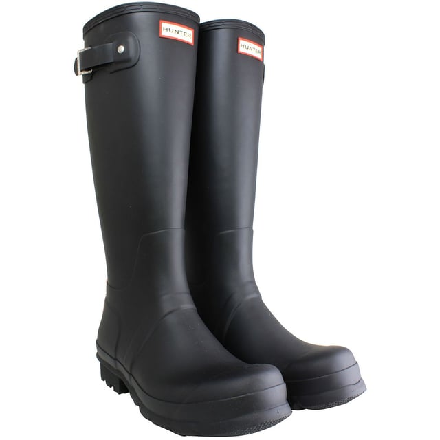 Step into enduring style and unparalleled functionality with the Hunter Original Tall Men's Black Wellington Boots. These boots embody the iconic design and craftsmanship that define the Hunter brand, providing a sleek and versatile option for conquering rainy days and outdoor pursuits with confidence.

Key Features:

 Classic Tall Design:  The boots feature the timeless tall Wellington silhouette, providing ample coverage and protection against rain and mud. This classic design ensures a polished and sophisticated look suitable for various occasions.

 Durable Vulcanized Rubber:   Crafted from durable vulcanized natural rubber, these boots are built to last. The material not only offers exceptional waterproofing but also stands up to the rigors of everyday wear, making them a reliable choice for various activities.

 Waterproof Construction:   Designed to keep your feet dry in the wettest conditions, the boots boast a fully waterproof construction. Tackle rain-soaked streets or muddy terrains without compromising on style or comfort.

 Comfortable Lining:   The boots feature a comfortable textile lining that provides a smooth feel against the skin. The breathable lining enhances overall comfort, making these boots suitable for extended wear.

 Adjustable Strap:   The boots are equipped with an adjustable strap at the top, allowing for a customizable fit. This feature not only adds a touch of style but also ensures a secure and snug fit around the calf.

 Sturdy Traction Sole:   The treaded sole provides excellent traction on various surfaces, ensuring stability and preventing slips. Navigate slippery sidewalks or uneven terrains with confidence.

 Signature Hunter Branding:   Showcasing the iconic Hunter logo on the front, these boots reflect the brand's commitment to quality and authenticity. The black color adds a versatile and sophisticated touch, making them a wardrobe staple.

 Versatile Styling:   Whether paired with casual jeans or worn as a functional accessory with outdoor gear, these boots effortlessly transition from urban streets to countryside landscapes.

Elevate your wet-weather wardrobe with the Hunter Original Tall Men's Black Wellington Boots â€“ a fusion of enduring style and practical functionality for the contemporary man who seeks both performance and sophistication.
