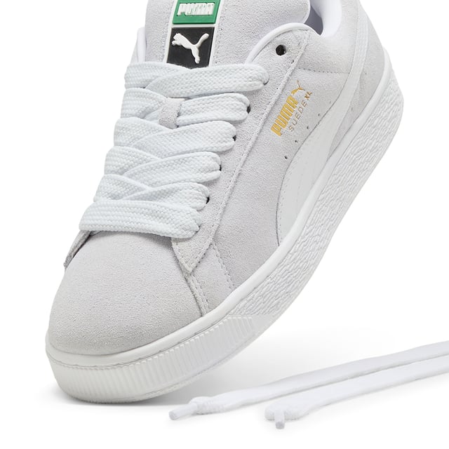 PRODUCT STORY: This fresh take on the classic Suede draws inspiration from PUMA’s heritage within breakdancing and its influence on modern streetwear. The Suede XL retains the Suede’s iconic DNA, but gives it a twist with an exaggerated padded collar and tongue, plus a chunkier sole. This execution features a full suede upper with a leather Formstrip. FEATURES & BENEFITS: PUMA’s leather products support responsible manufacturing via the Leather Working Group.www.leatherworkinggroup.com. DETAILS: Suede upper; Leather Formstrip; Suede tongue with mesh binding; Debossed and foil-printed PUMA branding on quarter panel; Mesh lining; Mesh sockliner; Rubber midsole; Rubber outsole; Lining: Textile, Other; Outsole: Rubber; Upper: Leather; Sockliner: Textile.