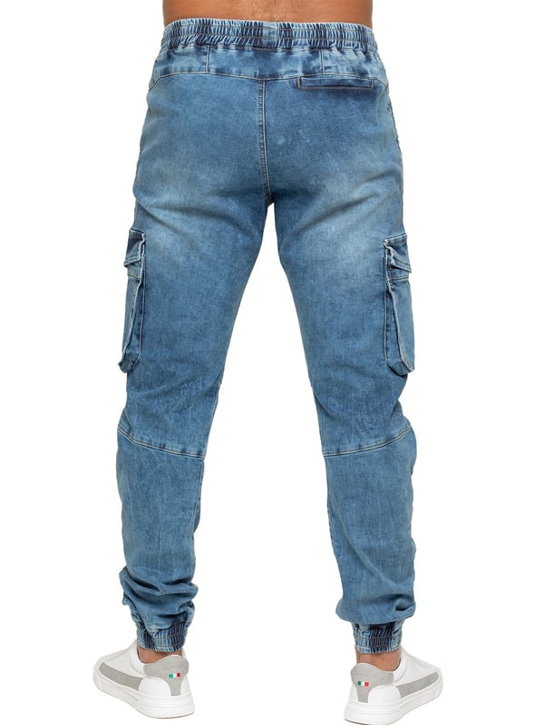 Enzo Herren Stretch-Jeans mit elastischem Bund und Bündchen. Verfügt über ein 5-Pocket-Design mit 2 Einschubtaschen, 1 Gesäßtasche, und 2 Vordertaschen mit aufgesetzten Taschen und Klettverschluss. Elastischer Bund mit verstellbaren Zugbändern. Schnitt- und Nähte-Design am Bein. Bündchen am Knöchel.