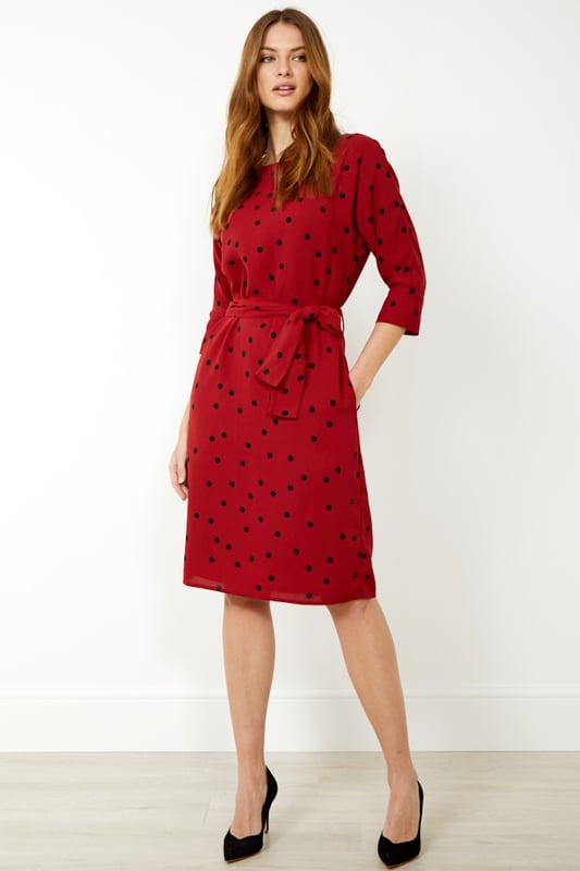 REASONS TO BUY: 

Spots and shift dresses: always in style
Flattering body-skimming fit and 3/4 length sleeves
Tie belt to show off your waist
Pockets, because who doesn't love pockets?
Keep it classic with black court shoes.