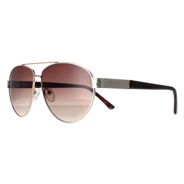 Guess Aviator Womens Gold Brown Gradient GF0414  Sunglasses feature a stylish, oversized frame made from high-quality acetate, providing a bold yet elegant look while ensuring durability and comfort. The lenses offer superior UV protection, effectively shielding your eyes from harmful rays and reducing glare. Adorned with the signature Guess logo on the temples and available in a variety of modern color options, the GGF0422 sunglasses add a touch of glamour to any outfit.