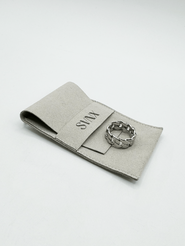 The ring's polished finish enhances its sophisticated appeal, making it a versatile accessory suitable for any occasion. Whether worn as a statement piece or a subtle nod to one's heritage, this Cuban silver ring embodies timeless style and cultural pride.  Ring Size 9. Stainless Steel.