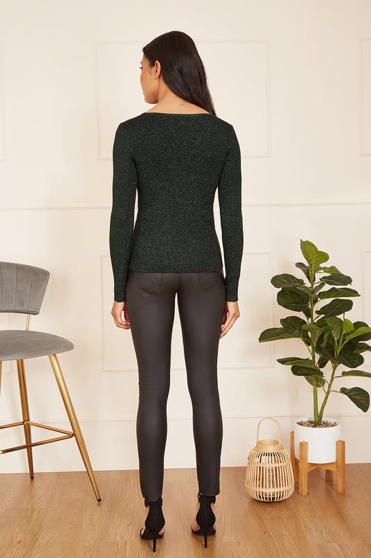 Inject a little glimmer into your life with this cute cardigan from Yumi. With a ribbed knit that offers a lovely fit to the body, V neckline fitted sleeves and gorgeous sparkle buttons - all in a lovely forest green colour that shines in lurex. Wear over a little black dress for parties, or style with skinny jeans and boots for a more casual occasion.