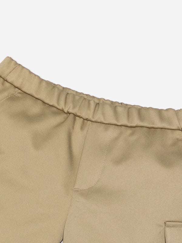 Introducing the Versace Baby Boys Logo Cargo Shorts in Beiche ‚ a staple for your little one's AW2024 wardrobe that blends luxury with playful practicality. Key features include:‚ Exquisite Craftsmanship: Meticulously made in Italy, offering unparalleled quality and durability.‚ Iconic Versace Logo: Embellished with the signature Versace logo for an unmistakable touch of luxury.‚ Versatile Beige Hue: Effortlessly stylish, this neutral shade compleates both casual and dressy looks.‚ Comfortable Fit: Designed with a soft fabric blend that ensures comfort during your baby‚ôs daily explorations.Elevate your child‚ôs style with these chic, functional shorts from Versace. Shop now for a timeless addition to their wardrobe!
