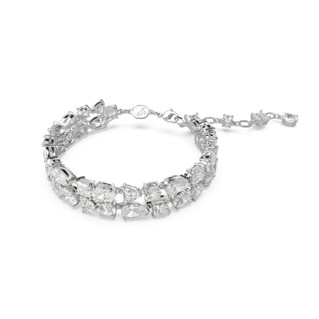 This dazzling Bracelet for Women from Swarovski is the perfect gift to spoil yourself or a loved one. The Bracelet is made out of Base Metal, colored Silver at Length: 19.5 cm weighing in at  grams with a Width of 1.4 cm at its widest point. The Swarovski 'Mesmera' Women's Base Metal Bracelet - Silver 5669927 is delivered in a stunning gift box and carries a two year warranty.