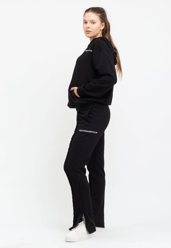 Tom Barron Dames trainingspak met kwart rits en logo in oversize
