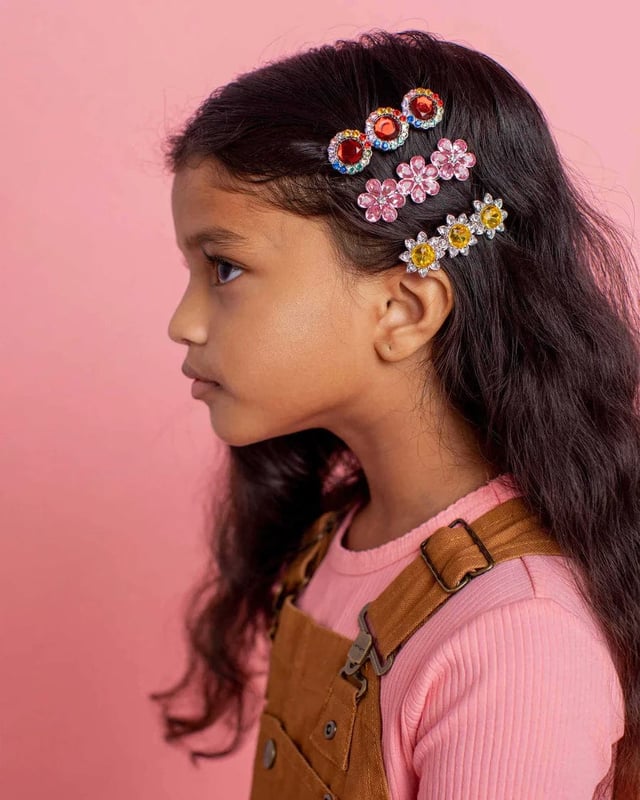 Face the music and dance with this Ballet Recital Gem Hair Barrette Set from Super Smalls. They might not help with fancy footwork, but this set of multi-coloured, gem-covered hair pieces will add shine and sparkle to twirls and steps, all whilst keeping hair where it's meant to be. Mix it up or wear together for a show-stopping look. 3 Hair Barrettes Reusable Presentation Box Not Suitable for Children Under 3