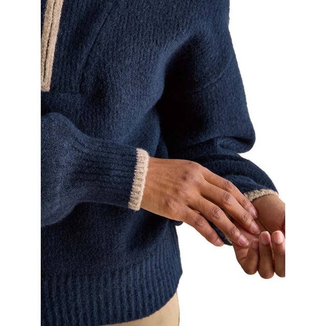Elevate your knitwear this season with the Elmore navy jumper. Its quarter zip fastening and dropped shoulders gives it an effortless 'throw on' feel, that will keep you comfortable and stylish. The oversized ribbed collar adds interest and features contrasting colour tipping. It's finished with a ribbed hem and cuffs. Style over a slim-fitting top for a layered-up look and your favourite pair of jeans.