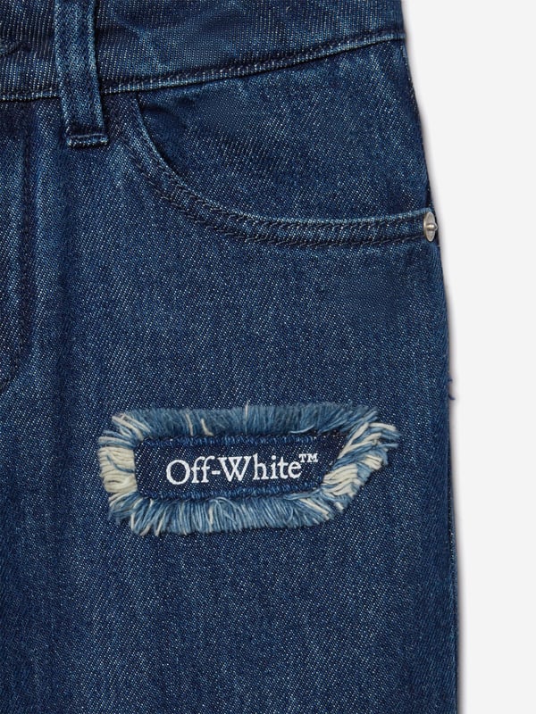 Introducing the Boys Bookish Patch Regular Jeans in Blue by Off White, a stellar addition for the discerning young fashion enthusiast's AW2024 wardrobe. Impeccably crafted, these jeans blend classic charm with contemporary flair. Key features include: Distinctive Bookish Patch: A unique, intellectual-themed patch adds an element of whimsy and sophistication. Premium Denim Fabric: Constructed from high-quality denim ensuring durability comfort. Versatile Blue Hue: Ideal for coordinating with a variety of tops and shoes.Elevate your boy's style with these must-have designer jeans. Perfect for school events or weekend outings!