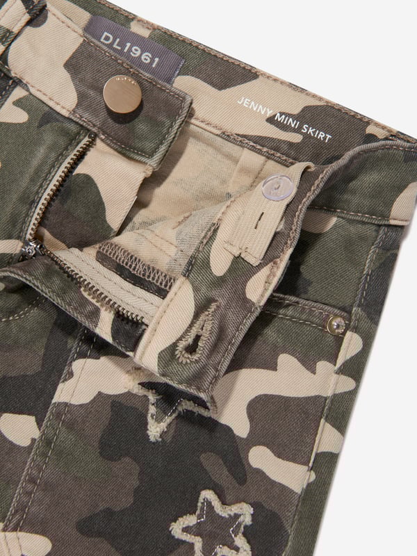 DL1961 project their sustainability ethics into their new revolutionised denim fabrics. This girls Jenny star camo green mini skirt captures the label's distinctive craftsmanship and rebellious nature. Made in recycled fibers, it features buckle insertions, a frayed edge, pockets and raw stitched embroidered stars. Match with the Jackson cargos or the Rocco utilitarian jacket for an extra impact. Denim Recycled Fibers  Clean Dyes  Solar Power  Less than 10 Gallons Of Water  Zip-Up Fastening  Buckle Insertions Pockets  Embroidered Stitches Detailing DL1961 : Girls Height8Y: 51-52.5" / 129cm 10Y: 53-55" / 134cm 12Y: 55.5-58" / 140cm14Y: 58.5-61" / 148cm16Y: 61.5-62.5" / 156cm