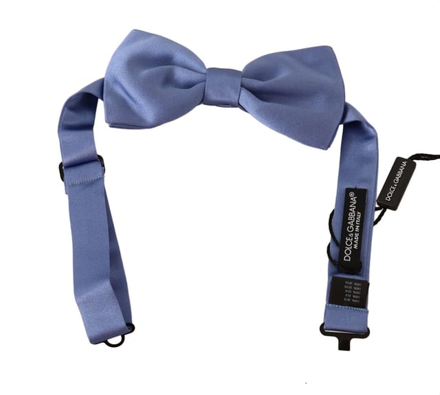 Brand: Dolce & Gabbana
  Condition: Brand New with Tags
  Color: Purple
  Style: Tied
  Material: 100% Silk
  Features a metal clasp in the form of a hook
  Adjustable length neck strap
  One size fits all
  Made in Italy
Material: 100% Silk