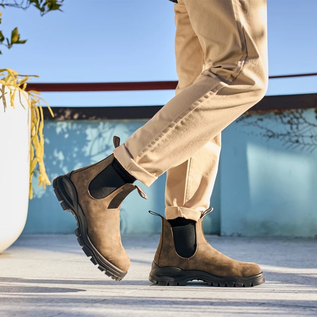The Lug Boot Series combines the traditional deep ridge work boot lug sole with our Originals chelsea upper for a unisex statement look. Extreme underfoot cushioning thanks to the super chunky outsole brings together utilitarian function coupled with iconic style.Durability never looked so good. The #2239 Rustic Brown chunky Chelsea boot is built for the toughest daily wear. XRDÂ® in the heel brings supreme shock absorption while the footbed with inbuilt airflow system keeps feet feeling fresh. Iconic Blundstone boots inspired by the toughest of work boots. Where fashion meets function. Specifications:- Brown premium water-resistant leather- Leather lining- Comfort Arch footbed with XRDÂ® Technology for maximum comfort- Lug sole (rubber) with deep grooves designed specifically to increase slip-resistance in varied environments- Polyurethane midsole- XRDÂ® in the heel for supreme shock absorption- Steel shank