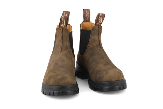 The Lug Boot Series combines the traditional deep ridge work boot lug sole with our Originals chelsea upper for a unisex statement look. Extreme underfoot cushioning thanks to the super chunky outsole brings together utilitarian function coupled with iconic style.Durability never looked so good. The #2239 Rustic Brown chunky Chelsea boot is built for the toughest daily wear. XRDÂ® in the heel brings supreme shock absorption while the footbed with inbuilt airflow system keeps feet feeling fresh. Iconic Blundstone boots inspired by the toughest of work boots. Where fashion meets function. Specifications:- Brown premium water-resistant leather- Leather lining- Comfort Arch footbed with XRDÂ® Technology for maximum comfort- Lug sole (rubber) with deep grooves designed specifically to increase slip-resistance in varied environments- Polyurethane midsole- XRDÂ® in the heel for supreme shock absorption- Steel shank