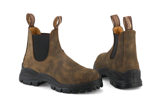 The Lug Boot Series combines the traditional deep ridge work boot lug sole with our Originals chelsea upper for a unisex statement look. Extreme underfoot cushioning thanks to the super chunky outsole brings together utilitarian function coupled with iconic style.Durability never looked so good. The #2239 Rustic Brown chunky Chelsea boot is built for the toughest daily wear. XRDÂ® in the heel brings supreme shock absorption while the footbed with inbuilt airflow system keeps feet feeling fresh. Iconic Blundstone boots inspired by the toughest of work boots. Where fashion meets function. Specifications:- Brown premium water-resistant leather- Leather lining- Comfort Arch footbed with XRDÂ® Technology for maximum comfort- Lug sole (rubber) with deep grooves designed specifically to increase slip-resistance in varied environments- Polyurethane midsole- XRDÂ® in the heel for supreme shock absorption- Steel shank