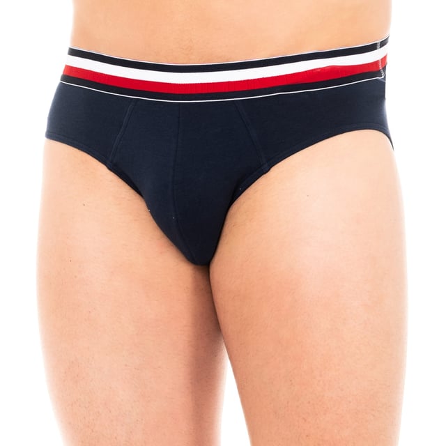 Tommy Hilfiger slip. 
 Navy colour 
 Elastic rubber waistband, with the name of the signature engraved consecutively. 
 Comfortable and breathable fabric. 
 Anatomical frontal, with the ability to hold loosely. 
 Seams seen in tone. 

 Composition: 95% Cotton - 5% Elastane 

 Washing instructions: 
 -Wash at max. 40ºC. 
 -Do not use bleach. 
 -Adds dry cleaning. 
 -Allows to use dryer. 
 -Planning at max. 130ºC. 

 Composition: 95% Cotton, 5% Elastane
 Care:
-Wash at max temperature. 40ºC.
 -Do not use bleach.
 -Supports dry cleaning.
 -Allows you to use a dryer.
 -Iron at max temperature. 130ºC.