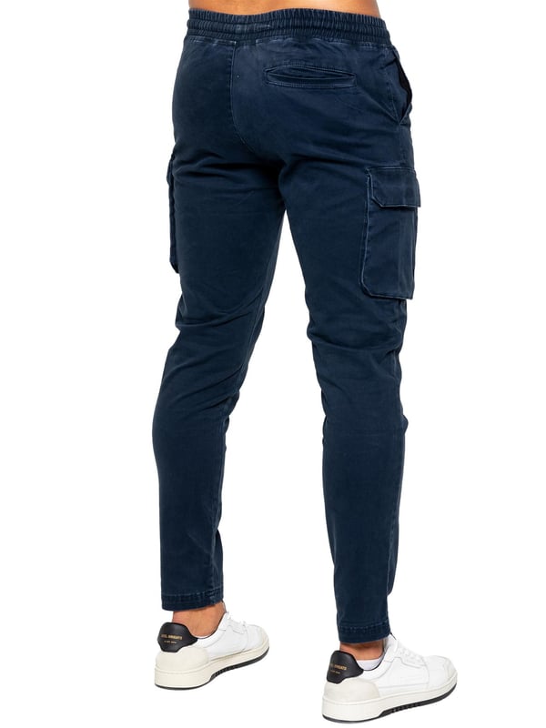 Enzo Mens Cargo Trousers. Regular Fit, Straight Leg, Enzyme Wash. 5 Pocket Design. 2 Side Pockets, 2 Cargo Pockets With Velcro Fastening. Single Back Welt Pocket. Elasticated Waistband With Adjustable Drawstring