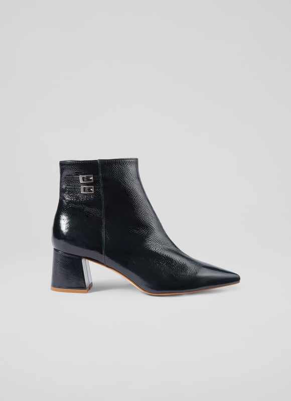 Bored of your black winter boots? Then may we introduce you to our latest recruit for spring/summer, the Missy ankle boots? The perfect transitional style, they're beautifully made in Spain from glossy and textural crinkle patent leather in navy blue, and they have a pointed toe, double buckle detail to the ankle, an inside zip and a 60mm block heel. Tres chic for everyday endeavours, but also comfortable whether you're running around town or running for the bus.