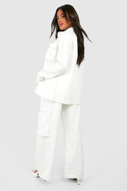 Wide-leg design for a relaxed, on-trend silhouette
        Cargo-style pockets add a utilitarian edge
        High-waisted fit for a flattering shape
        Zip-detail pocket for secure storage and added style
        Versatile denim fabric suitable for various casual occasions
    
    Make a bold statement with these eye-catching denim cargo trousers. The wide-leg cut offers a contemporary twist on classic jeans, whilst the high-waisted design accentuates your curves. The standout feature is the zip-detail pocket, adding both practicality and an edgy aesthetic. Perfect for the fashion-forward woman who values both style and functionality, these trousers can be dressed up or down with ease. For a chic daytime look, pair with a cropped jacket and sleek trainers, as seen on our model. Alternatively, style with a fitted bodysuit and heeled mules for an evening out with friends. The denim fabric ensures comfort and durability, making these trousers a versatile addition to your wardrobe for family gatherings, casual outings, or relaxed weekends about town.