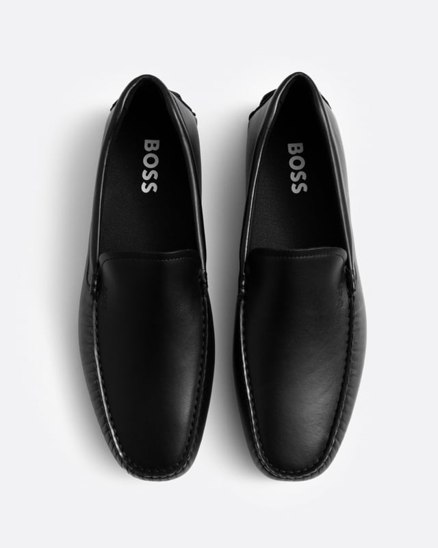 Easy-wear moccasins in nappa leather with a TPU driver outsole featuring signature details by BOSS.
Fastening top: Slip-onFully linedPackaging: Box
90% Polyamid, 10% Polyurethane, Sole: 100% Thermoplastic polyurethane, Upper material: 100% Cow skin, Innersole: 90% Polyamid, 10% Polyurethane
 
50517134
 