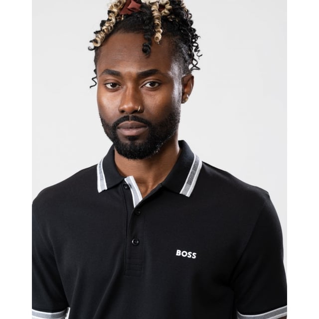 A signature polo shirt by BOSS Menswear, cut to a regular fit. Featuring contrast tipping and a logo at the left chest, this short-sleeved polo shirt is designed in cotton piqué and detailed with further BOSS branding at the undercollar.
Regular fitFlat-knit collarNumber of buttons: 3Short sleevesFlat-knit cuffsStandard length
100% Cotton
50469055
Model is 5"8 and wears size M