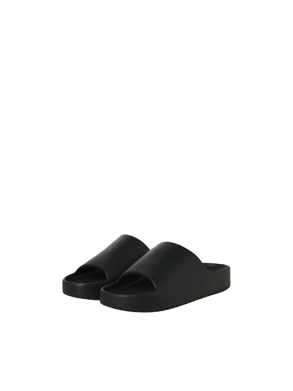 Jack & Jones schoenen Deze Jack & Jones loafers combineren een casual design met maximaal comfort - perfect om elke dag te dragen! Dankzij het ontwerp met open teen en de eenvoudige effen kleur kunnen ze op verschillende manieren worden gecombineerd en zijn ze geschikt voor elke gelegenheid. De schoenen kunnen snel en moeiteloos aan- en uitgetrokken worden zonder vervelende sluitingen, waardoor ze de ideale metgezel zijn voor ontspannen dagen. De hoogwaardige afwerking maakt ze comfortabel om te dragen, terwijl het lichtgewicht materiaal zorgt voor een luchtig gevoel. Of je nu thuis bent, door de stad slentert of op vakantie gaat - deze slip-on schoenen bieden comfort en stijl in één!