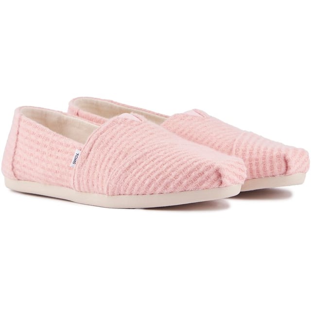 This Comfy Go-to Alpargata Slip-on Comes In A Soft And Chunky Rib Knit Design For A Cosy Texture. Stay Comfortable Thanks To The Padded Ortholite Footbed And The Durable, Cushy Outsole. These Iconic Plimsolls Are Further Complemented With A Branded Heel Cap And Toms Signature Branding Tab On The Side.