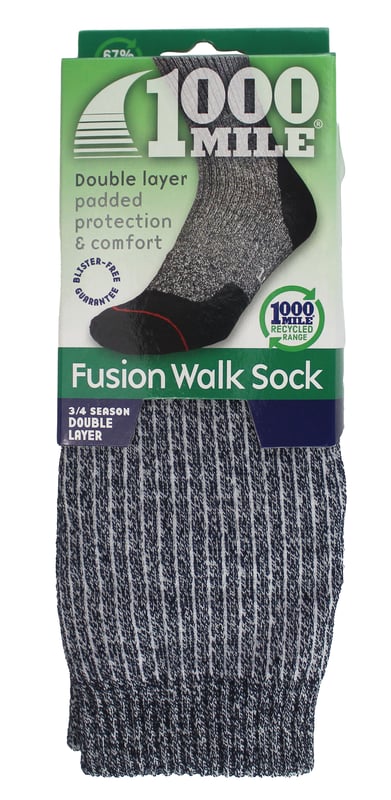 1000 Mile Women's Walking Socks Double LayerIntroducing the revolutionary 1000 Mile Fusion Walk Sock, defying conventional wisdom with its innovative design and advanced materials. This mid-calf length sock combines the best of both worlds, providing unmatched comfort, protection, and reduced friction.Say goodbye to the dilemma of choosing between padding or reduced friction. Our Fusion Walk Sock features a soft, durable outer layer and a moisture-wicking inner layer, delivering the blister-free guarantee of our double-layer socks. Enjoy padded comfort and protection, including full-length Achilles tendon padding.Designed for 3/4 season walking, our Fusion Walk Sock offers enhanced volume and warmth, ensuring your feet stay cozy and protected. To find the perfect fit, simply choose the same size sock as your foot size. For narrow fittings or sizes on the border, opt for a smaller size for a snug, wrinkle-free fit.Our Fusion Walk Sock is available in two sizes: Small (3-5.5 UK / EUR 36-38.5) and Medium (6-8.5 UK / EUR 39-42.5).Crafted with high-quality materials, the outer layer consists of 36% REPREVE® Nylon 6, 21% cotton, 12% acrylic, 11% wool, 18% polyamide, and 2% elastane. The inner layer is composed of 99% REPREVE® Nylon 6 and 1% elastane, ensuring durability and performance.For easy maintenance, machine wash the Fusion Walk Sock at 30 degrees. Avoid bleaching or tumble drying to preserve its quality. Embrace the ultimate fusion of comfort and performance with the 1000 Mile Fusion Walk Sock.Extra Product DetailsRevolutionary design defies conventional wisdom for unmatched comfort and protection.Enjoy the blister-free guarantee with soft outer and moisture-wicking inner layers.Full-length Achilles tendon padding for ultimate comfort and protection.Enhances volume and warmth for 3/4 season walking.Perfect fit by choosing the same size as your foot size.Crafted with high-quality materials for durability and performance.Easy maintenance with machine wash at 30 degrees.