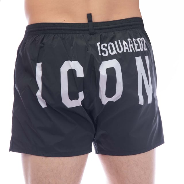 Dsquaered2 Midi Swim Boxers in black.- Elasticated drawstring waistband.- Side pockets.- Contrasting Dsquared2 logo.- Slim fit.- 92% Polyamide  8% Elastane.- Ref: D7B643950BLK