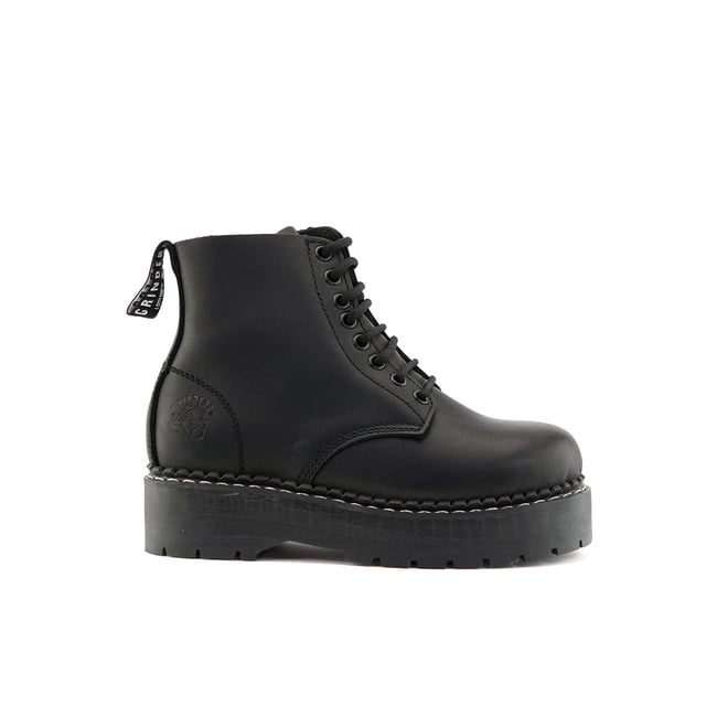 The Charlie by Grinders is a standout update to the classic derby boot, expertly designed for modern wearers. This style features an 8-eyelet lace system for a secure fit and a practical side zip for effortless entry and exit. The boot is built with Goodyear welted construction, enhancing its durability and robustness. It boasts extra thick soles for superior comfort and protection, while Grinders' Air Cushioned Soles (ACS) provide excellent support and shock absorption. Made with premium leather uppers and full grain leather, the Charlie offers both a sophisticated look and lasting performance, making it a versatile addition to any footwear collection. 8 Eyelet Derby Boot, Goodyear Welted, Extra Thick Soles, Side Zip, Grinders’ Air Cushioned Soles (ACS), Leather Uppers, Full Grain Leather