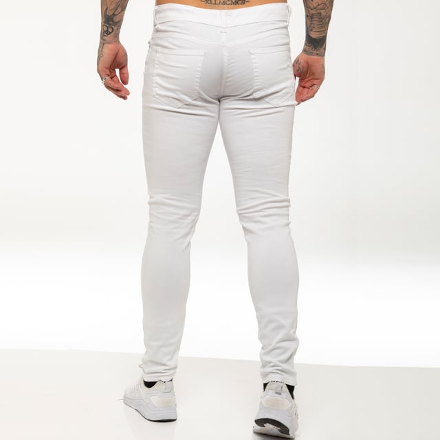 White skinny 2025 jeans ripped