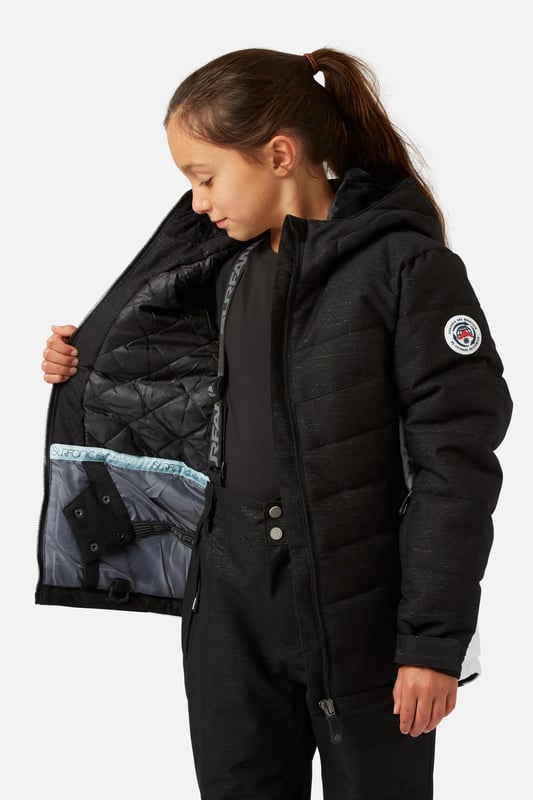The Disco Girls ski jacket is a durable premium ski jacket, fully teched up for all conditions. Regular fit and length with baffled construction make this great all-rounder. Plenty of features to keep you happy and comfortable all day up the mountain or simply on the way to school.

    Fit: Regular Fit
    Shell Fabric: 100% Recycled Polyester Ripstop.
    Waterproof Rating: 10,000 mmor simply put the fabric will sustain 10 meters of water pressure onto the face of the shell.
    Breathability Rating: High Breathability - 10,000 g/m2This level of breathability will allow the heat generated from your body to escape without allowing condensation to build up and make you wet from the inside.
    Treatments: Hydrophobic Durable Waterproof Repellent finish (DWR) Is applied to the outer shell to make the jacket highly water and stain resistant. You will see water bead and roll off the outer shell to help stop the fabric becoming saturated and wetting out.
    Insulation: 100% recycled low loft polyester 80 grams in the body and 40 grams in the arms.

    Feature List
    Taped seams
    Internal zipped pocket with goggle wipe
    Fixed hood
    Wrist guard
    Super soft chin guard
    Lift pass stash pocket
    Chunky main zipper
    Powder skirt
    Dry butt patch
    Internal/External storm flaps
    Multiple zipped pockets
    Machine washable
