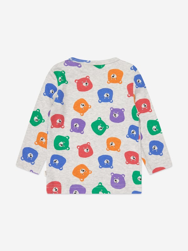 The Bonnie Mob depict passion and colour into their eco-friendly, sustainable abstracts. This baby unisex long sleeve t-shirt is reflective of the label's passion for beautiful aesthetics with an innovative twist. Made in refined cotton rainbow patterned bears.  Press Stud Fastenings 100% GOTS Certified Organic Cotton GOTS Certified Organic Brand
