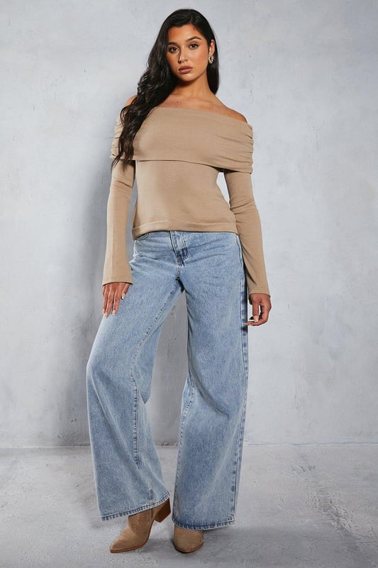 Bardot off-shoulder neckline
Long sleeves with ribbed texture  
Form-fitting stretch jersey fabric
Straight hem cut

This on-trend bardot top from Misspap features an alluring off-shoulder design with long sleeves. Crafted from a soft stretch jersey fabric with a body-hugging fit, it flatters the figure beautifully. The ribbed texture adds visual interest. Pair this versatile top with high-waisted jeans or a skirt for a chic day or night look. It works well layered under leather and denim jackets too. The fold-over bardot neckline is perfect for showcasing dainty necklaces. For a going-out look, style with heels and statement earrings to be the centre of attention. This top transitions seamlessly from casual daywear to evening cocktails.