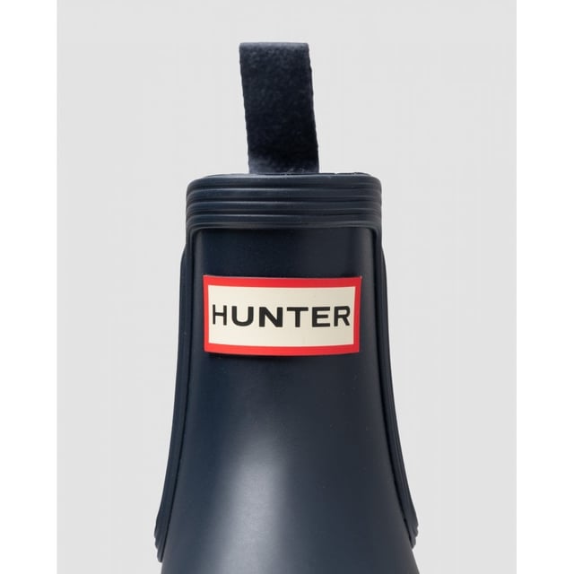 The New And Improved Hunter Original Chelsea Wellington Boot Has An Even More Optimum Fit To Maximise All-day Comfort And Style. Ready For The Changing Seasons In The Countryside As Well As Rainy Days In The City, Each Welly Boot Is Handcrafted From Natural Rubber And Vulcanised For Superior Protection. Retaining The Iconic Silhouette Of A Traditional Chelsea, It Features Elasticated Gussets And Has A Nylon Pull-tab For An Easy On And Off. In A Classic Dark Blue Matte With An Eye-catching Logo On The Front, These Waterproof Outdoor Chelseas Are A Wet Weather Wardrobe Essential.