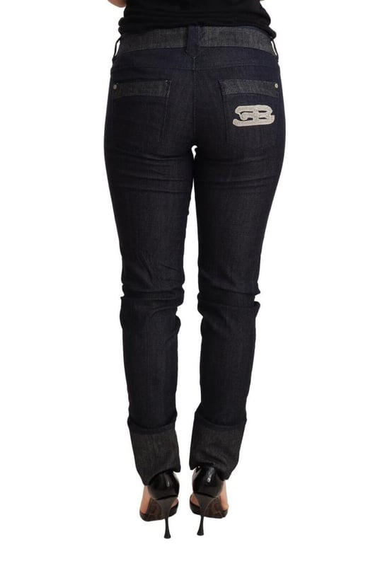 Marca: Ermanno Scervino  
Material: Algodón  
Color: Azul oscuro  
Ajuste: Pantalón skinny de cintura baja  
Cierre: Cremallera  
Bolsillos: 5  
Detalles del logo