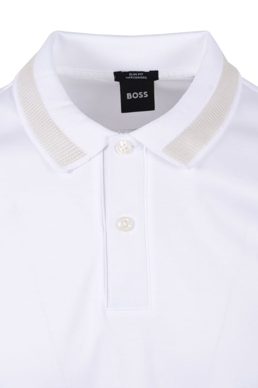 Boss H-Phillipson 199 Polo Shirt in White
Elevate your casual wardrobe with the timeless elegance of the Boss H-Phillipson 199 Polo Shirt. Crafted from premium mercerized cotton for exceptional softness and a luxurious feel, this polo shirt exudes understated sophistication.
 
Features

Slim Fit: Tailored for a contemporary and flattering silhouette.
Mercerised Cotton: Offers superior softness, lustre, and durability.
Two-Button Placket: Features elegant pearlescent buttons for a refined touch.
Ribbed Polo Collar: With single-bed detail in grey for a touch of contrast.
Ribbed Cuffs: Ensure a comfortable and secure fit.
Signature BOSS Logo: Woven pinch tag on the lower left side seam.
Side Vents: Allow for ease of movement and a comfortable fit.
Woven Reinforcement Tabs: On the interior side vents in signature BOSS colours.
100% Cotton: Guarantees breathability and comfort.