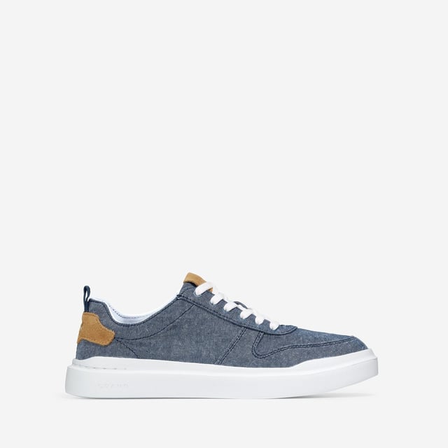 We've given our much-loved, signature GrandPro Rally Court Sneaker an update in organic canvas. Crafted from high-end-yet-durable materials, it features a luxuriously cushioned GRANDFOAM footbed, an EVA outsole, and a classic old-school sneaker vibe