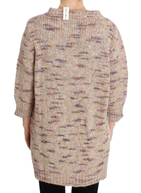 Brand new with tags
  Oversize fit
  V-neck design
  Made in Italy
  Quality materials: 57% PC 20% WM 10% wool 13% PA
  Subtle logo details
  Versatile and easy to style
Material: 57% PC 20% WM 10% Wool 13% PA