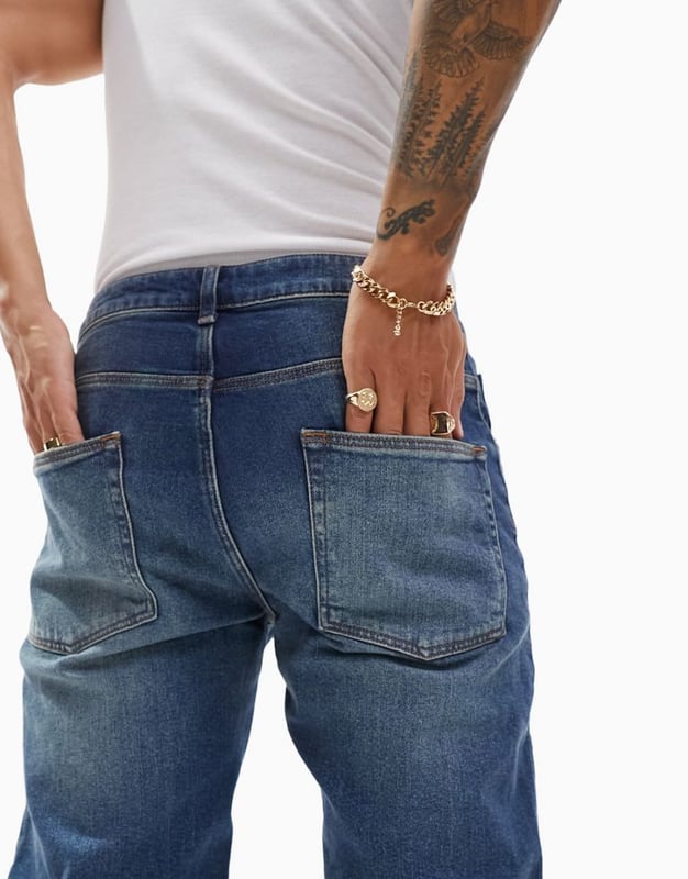 ASOS DESIGN stretch tapered jeans in dark wash blue