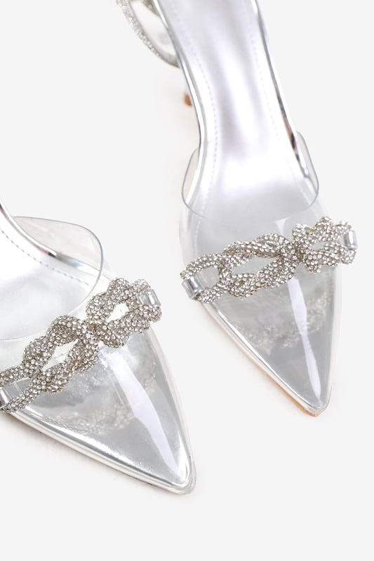 Step into the spotlight with our Monaco Perspex Heel with Embellished Detail and Diamante Cross Strap. These stunning heels are designed to make a statement and add a touch of glamour to any outfit.

Key Features:



Effortless Style: The combination of perspex material, pointed toe, and diamante detail create a unique and eye-catching look. These high heels effortlessly elevate your style, making you the centre of attention wherever you go.

Secure Fit: The diamante heels not only add a touch of sparkle but also ensure a secure fit that hugs your foot.

Durable Construction: Made with high-quality materials, our Perspex Pointed Toe Heels are built to last. The sturdy construction and reliable stitching ensure their durability, making them suitable for any occasion.


Specifications:


Heel height: 3.5' (9 cm) approx
Toe shape: Pointed

Invest in our Monaco Perspex Heel with Embellished Detail and Diamante Cross Strap heels for a perfect combination of style, comfort, and glamour. Make a statement and turn heads wherever you go. Get yours today and step into a world of elegance and sophistication!