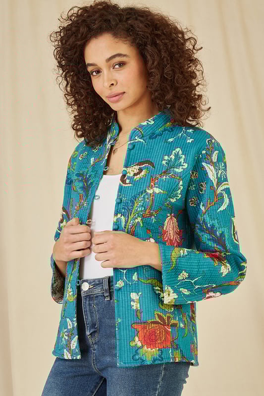 For bang on trend outerwear for the summer we love this Teal floral quilted jacket from Yumi. Made using a traditional quilting technique, from lightweight cotton, this reversible garment really is a show stopper. With a different unique print on the inside, the tags and care labels are sewn into the pockets so you can change your look easily. Pair with jeans and a T-shirt for an off duty look, or 2!