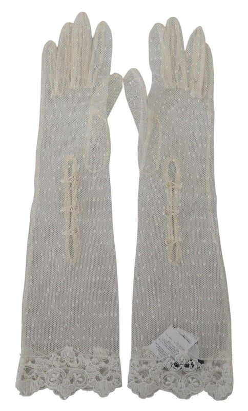Gorgeous brand new Dolce & Gabbana elbow length gloves
  Made in Italy
  Logo details
  Crafted with high craftsmanship
  Material: 90% Cotton 7% Viscose 3% Nylon
  Rare and stylish
  Perfect for adding sophistication to any outfit