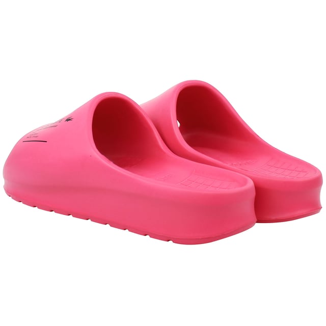 The Lacoste Serve Slide 2.0 223 2 CFA Women's Pink Sliders are a stylish and comfortable option for casual wear, poolside relaxation, or beach outings. With a sleek design and a soft pink colorway, these sliders bring a touch of elegance to your everyday look.
Â 
Key Features:
Ergonomic Footbed: 

Contoured for superior comfort and support, making them perfect for all-day wear.


Durable Synthetic Strap: 

Features the iconic Lacoste crocodile logo embossed for a chic and recognizable touch.


Slip-On Design: 

Offers easy on-and-off wear, ideal for quick outings or relaxed settings.


Textured Rubber Outsole: 

Provides excellent grip and stability on both wet and dry surfaces, ensuring safety in various environments.


Lightweight Construction: 

Minimizes fatigue, allowing for extended comfort during wear.


Water-Resistant Materials: 

Suitable for pool, shower, or beach settings, designed to withstand water exposure without compromising quality.


Soft Pink Colorway: 

A feminine and versatile shade that complements casual, summer, or athleisure outfits.


Â 
The Lacoste Serve Slide 2.0 223 2 CFA Women's Pink Sliders are the perfect combination of functionality and style, making them a go-to choice for relaxed, everyday wear or sunny getaways.
Â 
Â 
Â 