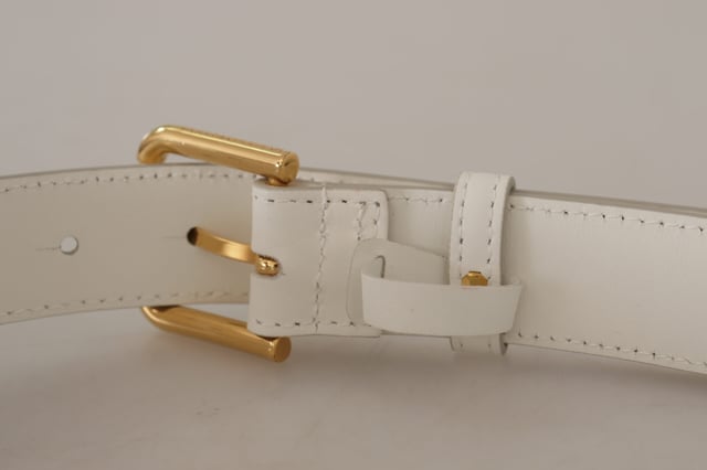 100% Authentic Dolce & Gabbana leather belt
  Crafted from Quality leather
  Gold logo engraved buckle
  Made in Italy
  Width: 3 cm
  Designed for women
  Classic white color with logo details
Material: Leather
