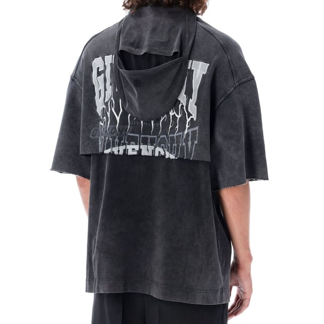 Introducing the Givenchy Grey T Shirt - the perfect addition to your wardrobe! This tee offers a comfortable and stylish option for any casual occasion. Its oversized fit is both trendy and flattering, making it a must-have piece for fashion-forward individuals. Elevate your style with Givenchy!, Givenchy Branding, Overlapped Hoodie/Tee Design, Crew Neck Tee With Additional Hood, Logo On Front and Back, 100% Cotton, Streetwear, Stars Around Neck, Grey Tee