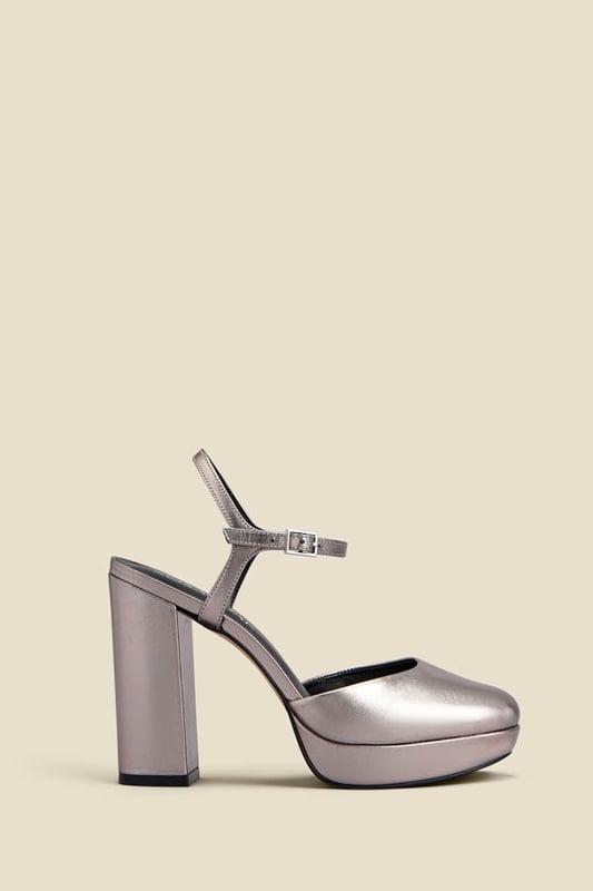 Platforms are back
You won't believe how comfy they are
Luxe metallic leather - they're made for dancing
Closed toe means no pedi needed
Style with a silky blouse and flared jeans
Pair with a dress for weddings and parties
