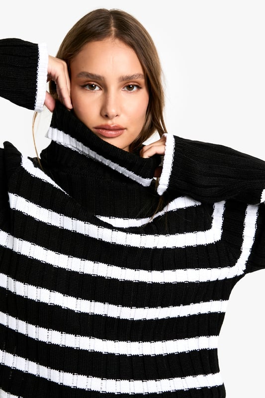 It's the season to feel snug and what better way than with this oversized jumper. Bigger than your usual size which elongates your silhouette, our women's oversized jumpers are cosy and comfortable for your autumn and winter wardrobe. Perfect for whatever plans you've got coming up, make a satin slip dress a little more casual with an oversized rib knit thrown on and banish those winter blues by stepping into a cable knit baggy jumper over leggings and ribbed socks. Warm and cosy is the vibe this season.Style: Oversized JumperDesign: StripesNeckline: Roll NeckSleeve Length: Long Sleeve