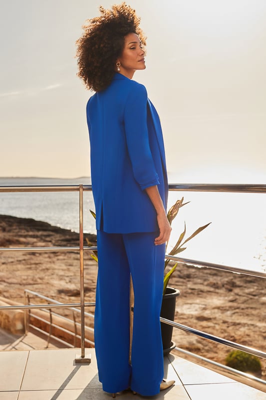 That colour looks great on you Cut for a comfy but chic relaxed fit Flattering wide-leg silhouette you can dress up or down Add the matching blazer for maximum impact Let the cobalt pop with a simple white top Do smart-casual with sandals or trainers, elevate them with wedges and heels Inside leg to fit: Short 29" | Regular 31" | Long 33"