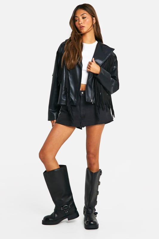 A short, close-fitting jacket complete with zips and stud detailing, rock some seriously cool vibes on the day-to-day with a biker jacket. Whether you prefer cropped, longline or a classic oversized shape for vintage vibes, biker jackets are a wardrobe classic that's perfect for edging up your outfit. Layer up your dress with a suede biker jacket, or show off your shape with a black biker jacket that's both timeless and flattering.Style: Biker JacketFabric: Faux LeatherSleeve Length: Long Sleeve